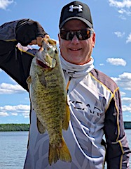 Huge Trophy Smallmouth Bass Bring a Smile at Fireside Lodge by Craig